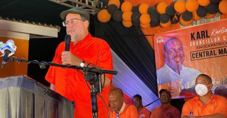 Cool down debt reduction, spend money on people, Golding tells Gov’t